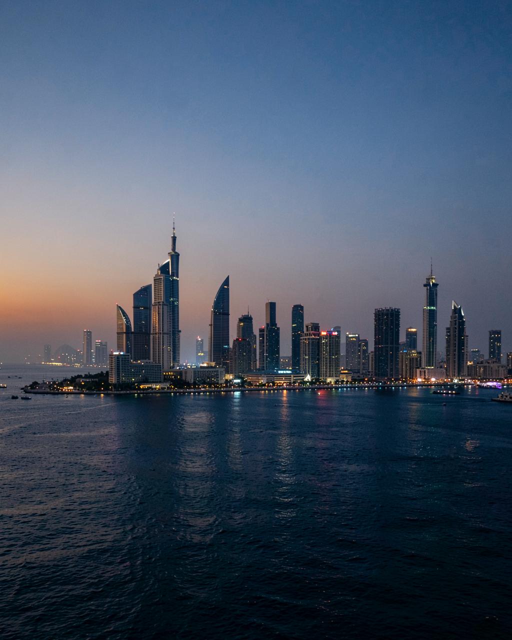 Manama skyline across the gulf at dusk